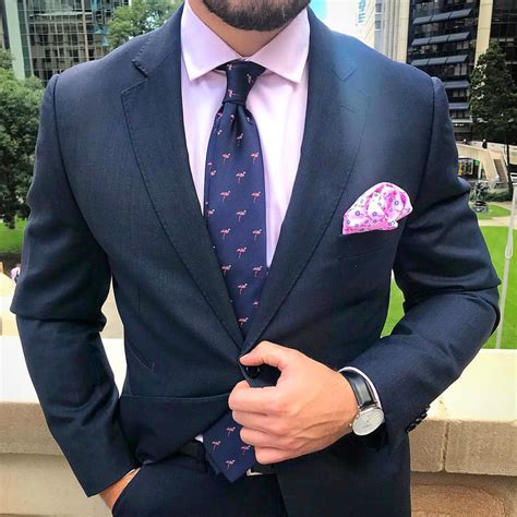 navy suit with pink shirt